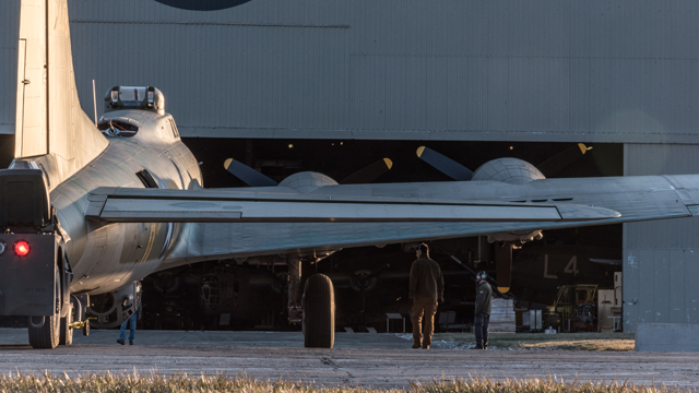 Tight squeeze. The Memphis Belle is carefully guided into the Museum. (U.S. Air Force photo)